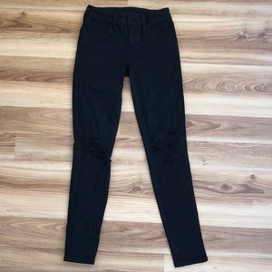 distressed black american eagle skinny jeans